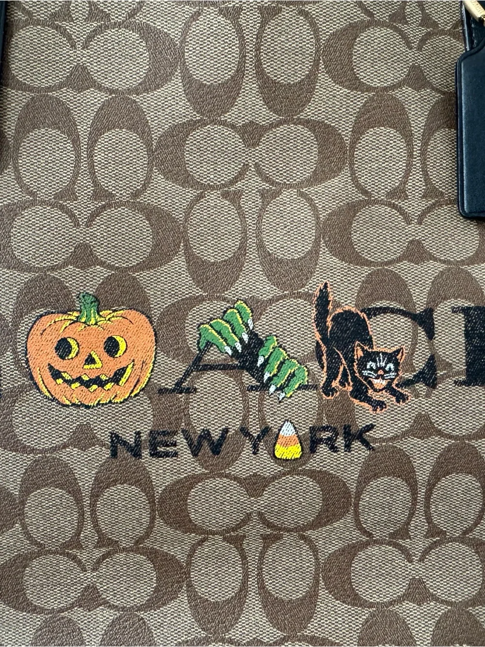Coach Brown Signature Canvas Tote with Black Straps and Halloween Motifs